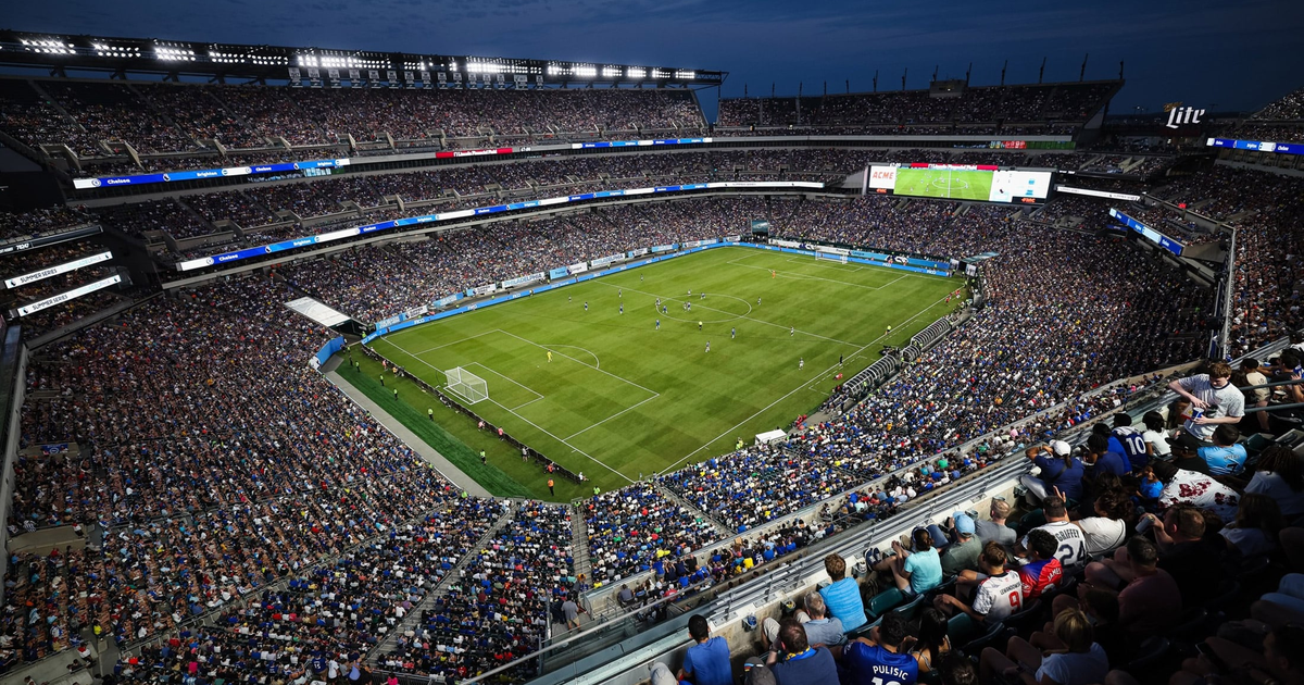 Estádio lotado durante a Copa do Mundo 2026 com torcedores de várias seleções